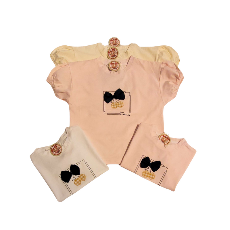 CAMISETA COM LACINHO NO PEITO