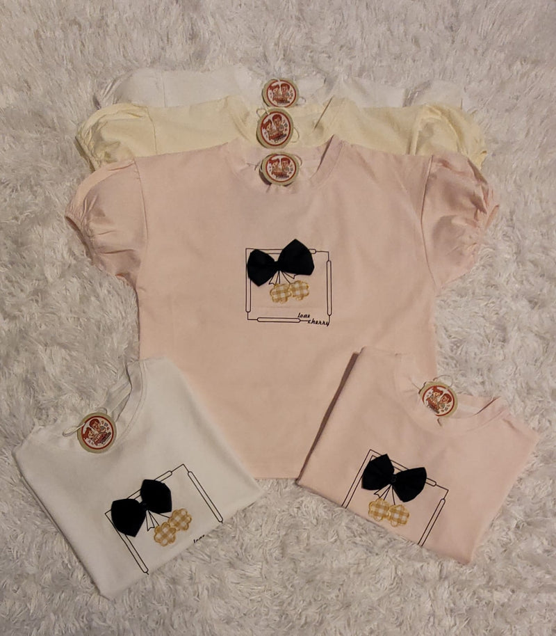 CAMISETA COM LACINHO NO PEITO